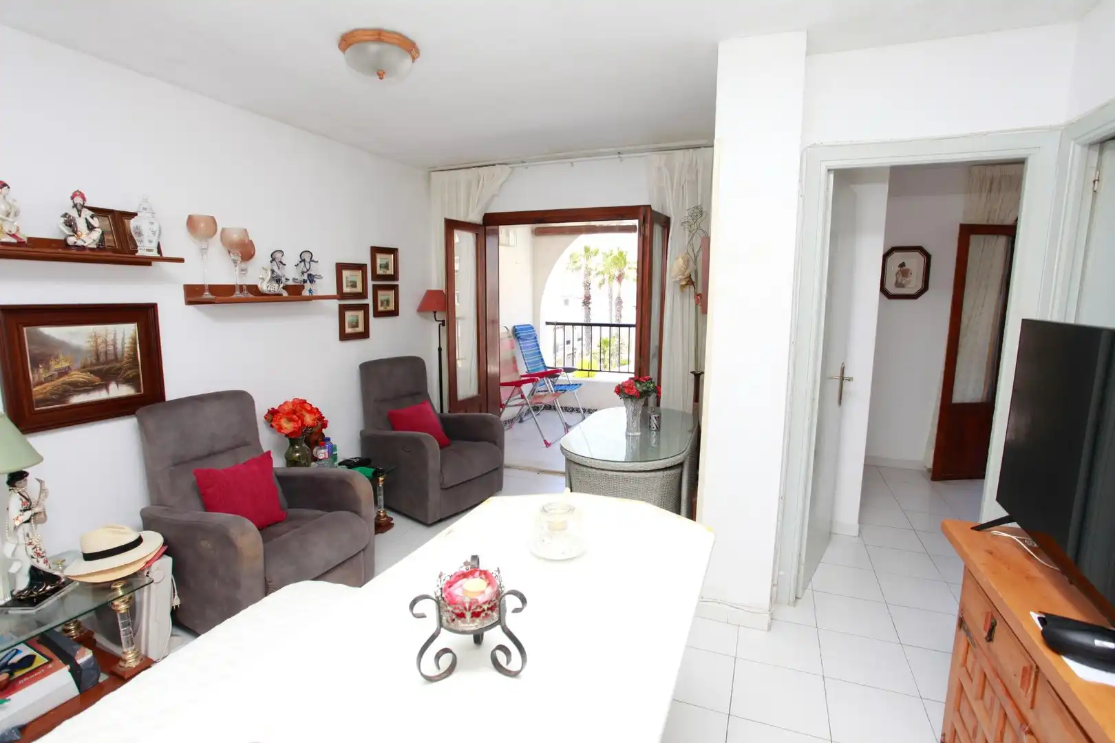 Sala de estar de Apartamento en venta en La Manga del Mar Menor con Jardín privado, Terraza y Amueblado