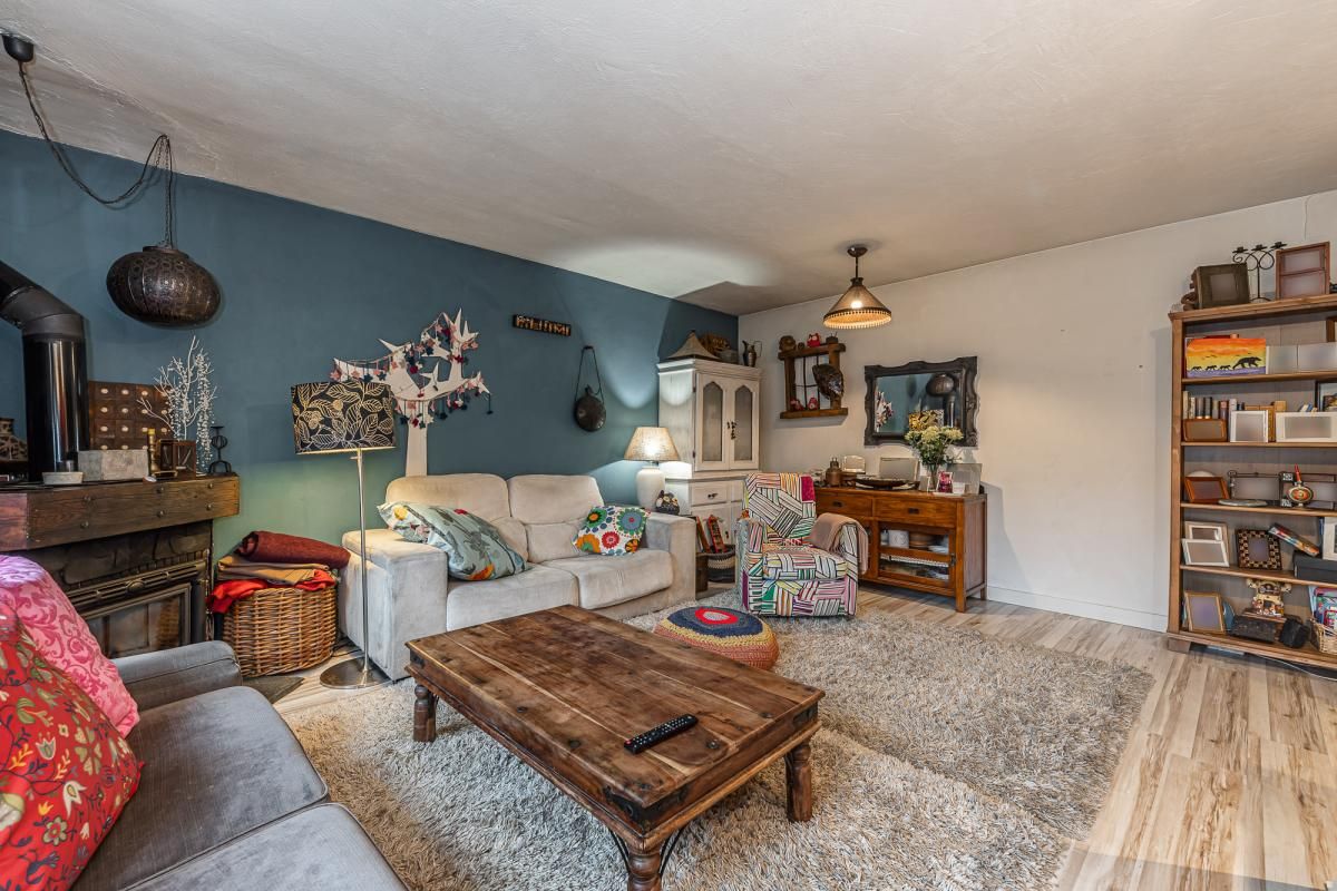 Sala de estar de Casa adosada en venta en Majadahonda con Jardín privado, Trastero y Piscina