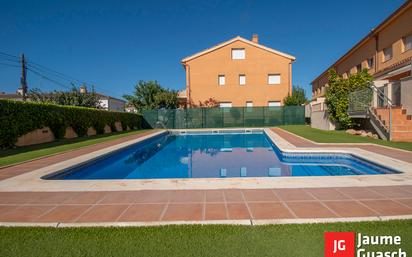 Swimming pool of Single-family semi-detached for sale in Torredembarra  with Air Conditioner, Heating and Private garden