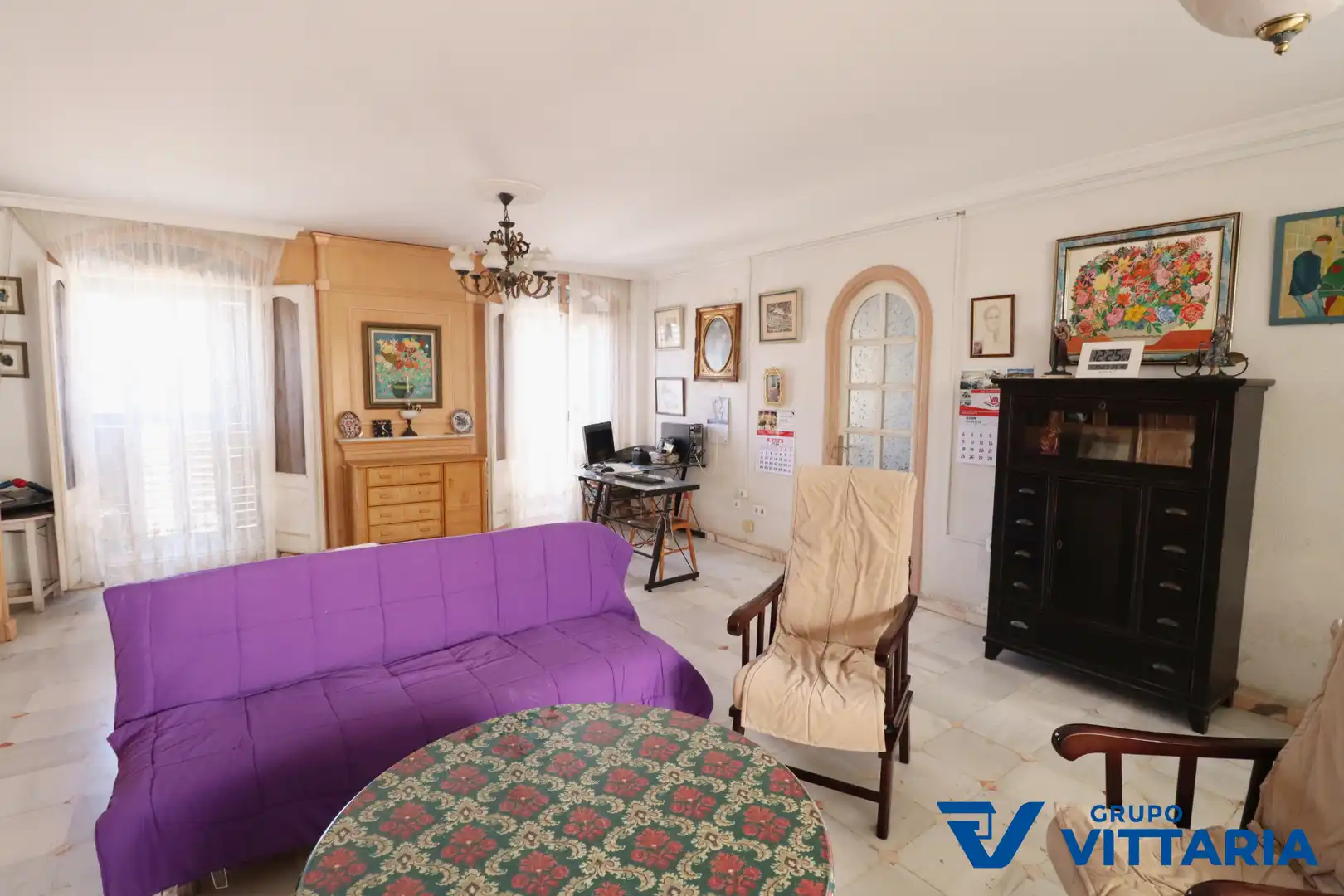 Sala de estar de Casa adosada en venta en Almería con Aire acondicionado, Terraza y Trastero
