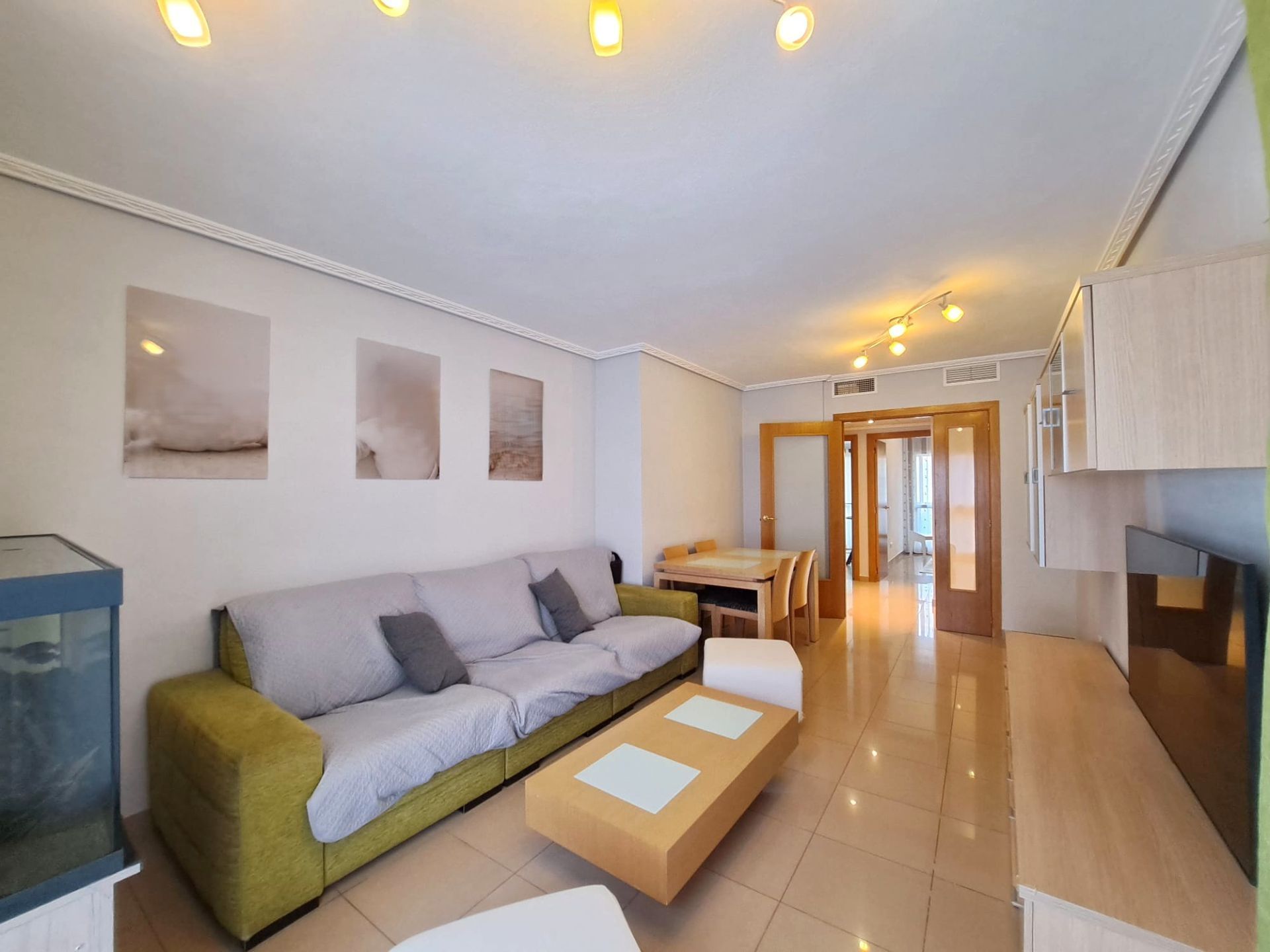 Sala d'estar de Apartament en venda en Finestrat amb Aire condicionat, Terrassa i Traster