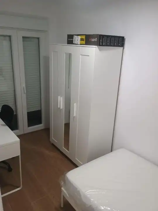 Bedroom of Flat for share in Ourense Capital   with Heating, Furnished and Balcony