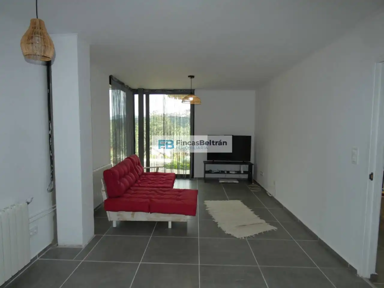 Sala d'estar de Casa o xalet en venda en Cervera del Maestre amb Calefacció, Jardí privat i Terrassa