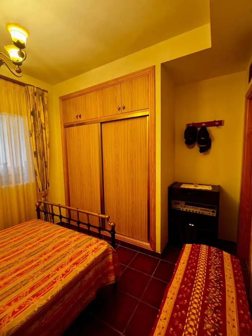 Habitación de Casa adosada en venta en Torrox con Aire acondicionado, Piscina y Amueblado
