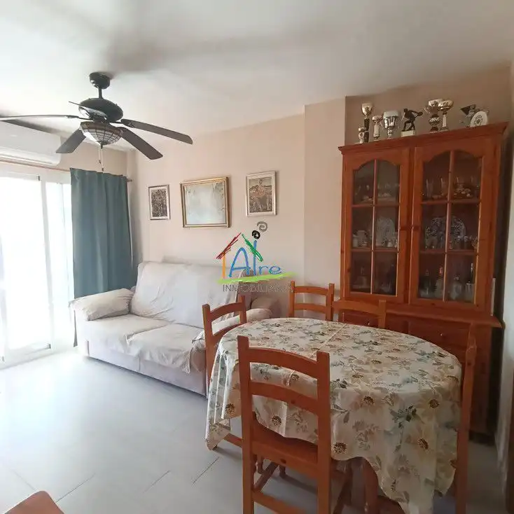 Sala d'estar de Apartament en venda en Almonte amb Aire condicionat, Terrassa i Piscina comunitària