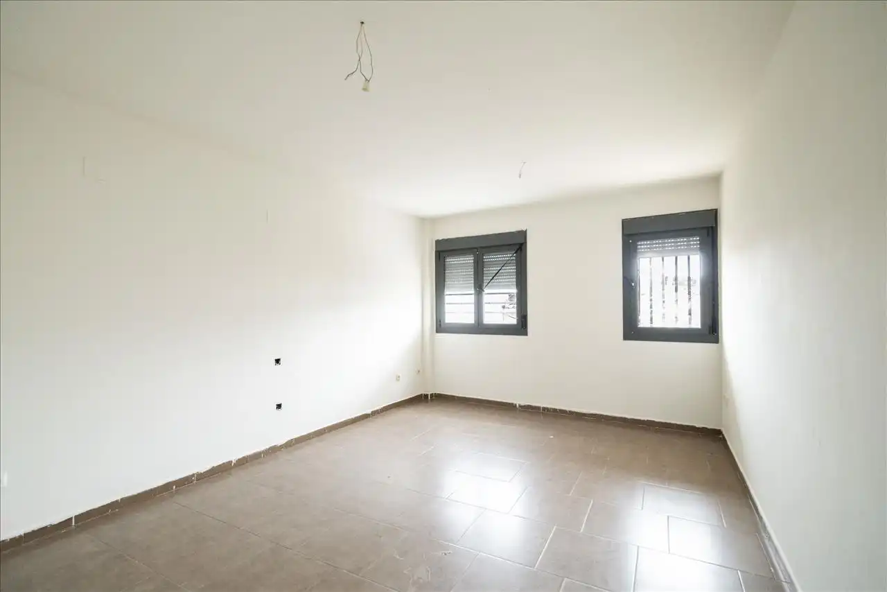 Sala d'estar de Casa adosada en venda en Cuéllar amb Terrassa