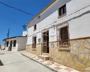 Exterior view of Single-family semi-detached for sale in Encinas Reales  with Terrace, Storage room and Swimming Pool