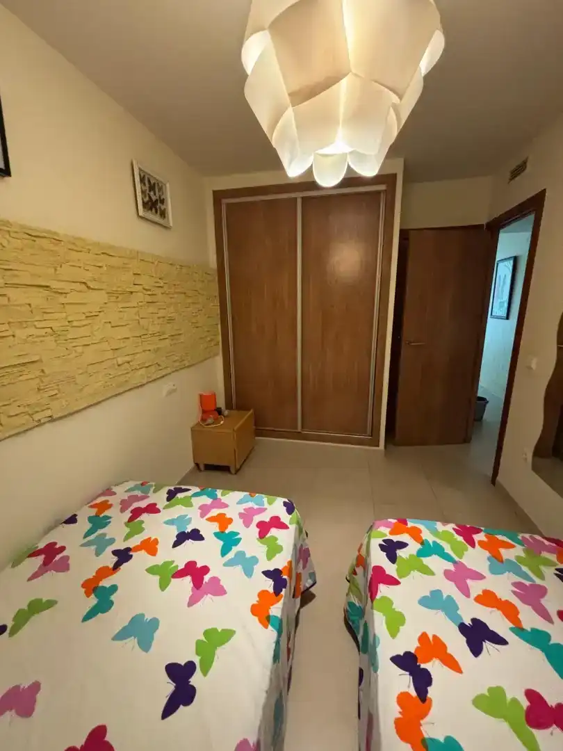 Dormitori de Apartament de lloguer en Oropesa del Mar / Orpesa amb Aire condicionat, Piscina i Moblat