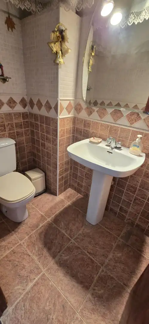 Bany de Casa adosada en venda en Málaga amb Aire condicionat, Calefacció i Jardí privat