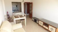 Sala de estar de Apartamento en venta en Roquetas de Mar con Piscina y Piscina comunitaria