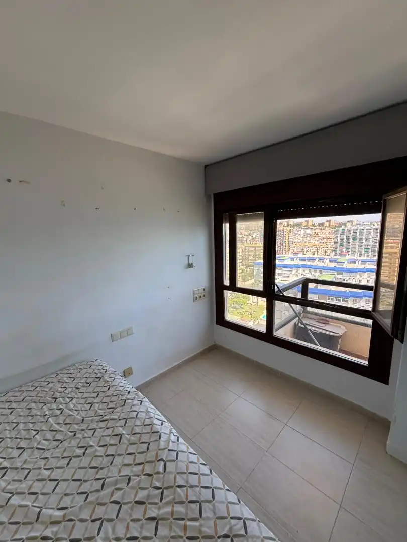 Habitación de Dúplex en venta en Benalmádena con Aire acondicionado, Terraza y Piscina comunitaria