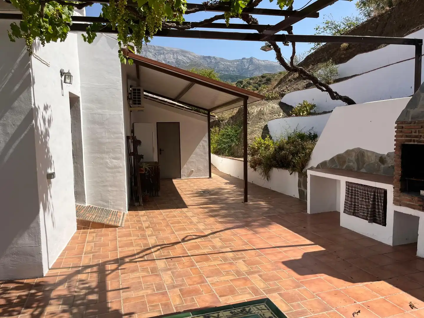 Terrassa de Finca rústica de lloguer en Sedella amb Aire condicionat, Jardí privat i Traster