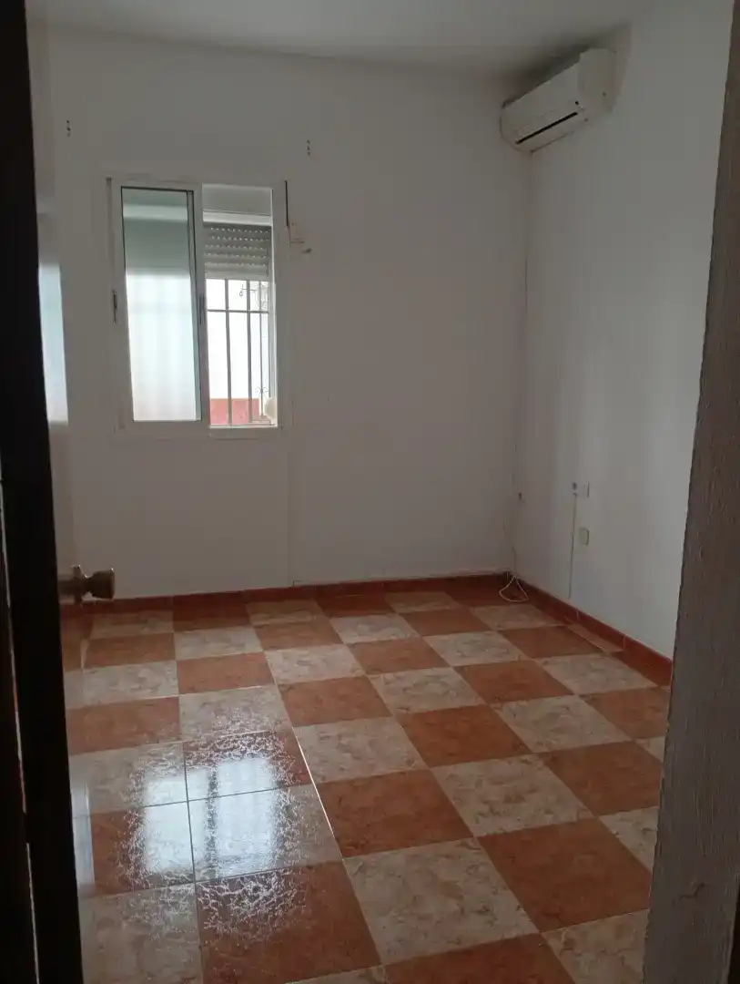 Habitación de Casa adosada en venta en Benacazón con Aire acondicionado