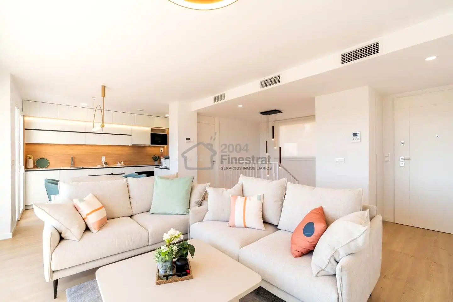 Sala de estar de Casa adosada en venta en La Nucia con Aire acondicionado, Jardín privado y Terraza