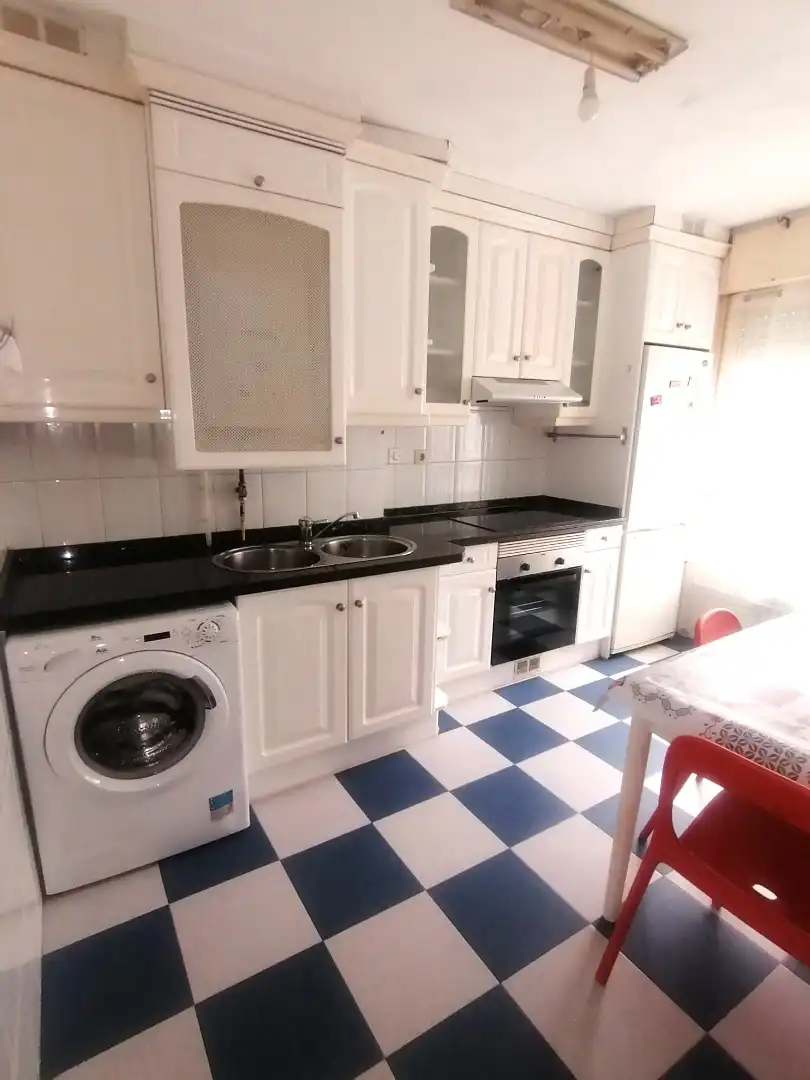 Kitchen of Flat for rent in Gijón   with Heating, Parquet flooring and Storage room