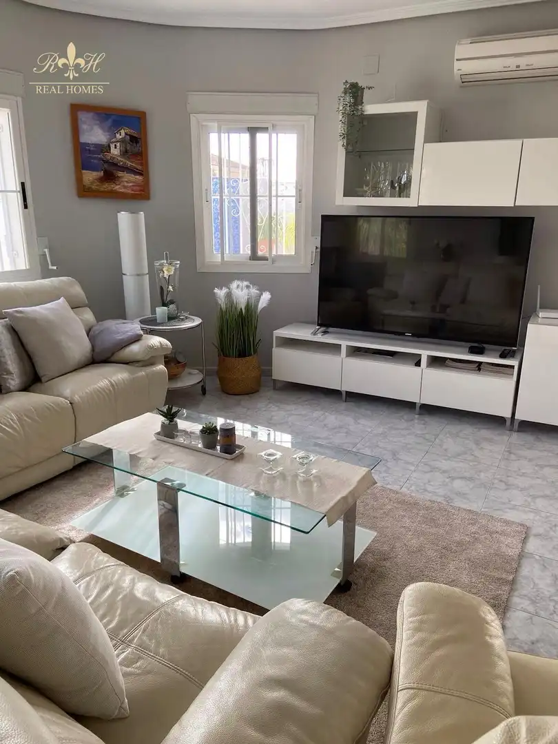 Living room of Detached homes for sale in L'Alfàs del Pi  with Air Conditioner, Heating and Swimming Pool