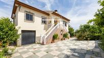 Exterior view of House or chalet for sale in Cúllar Vega  with Heating, Storage room and Swimming Pool