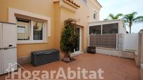 Exterior view of Single-family semi-detached for sale in Els Poblets  with Air Conditioner, Heating and Terrace