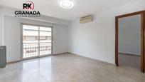 Bedroom of Flat for sale in  Granada Capital  with Air Conditioner and Terrace