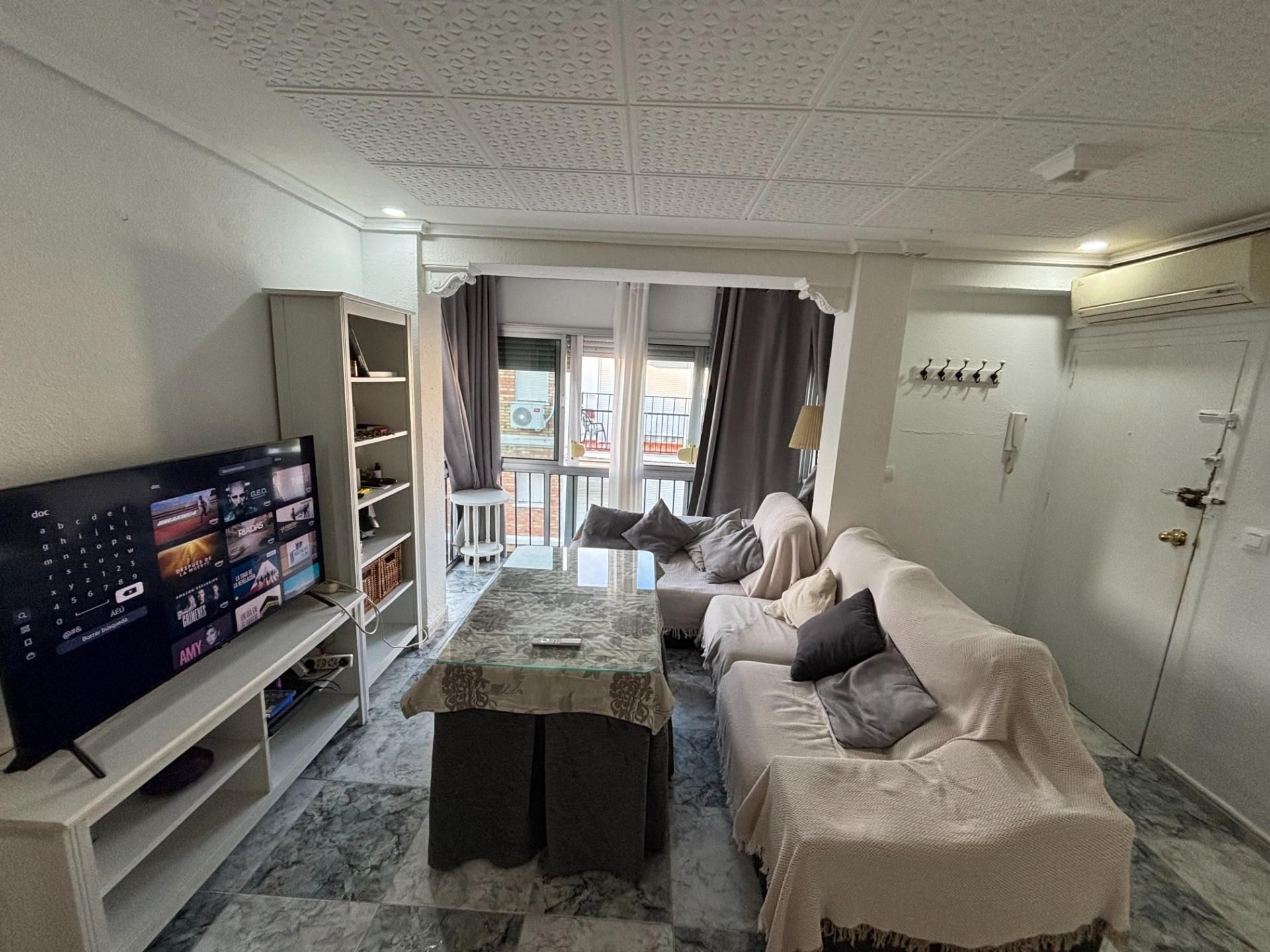 Living room of Flat for sale in San Juan de Aznalfarache  with Air Conditioner