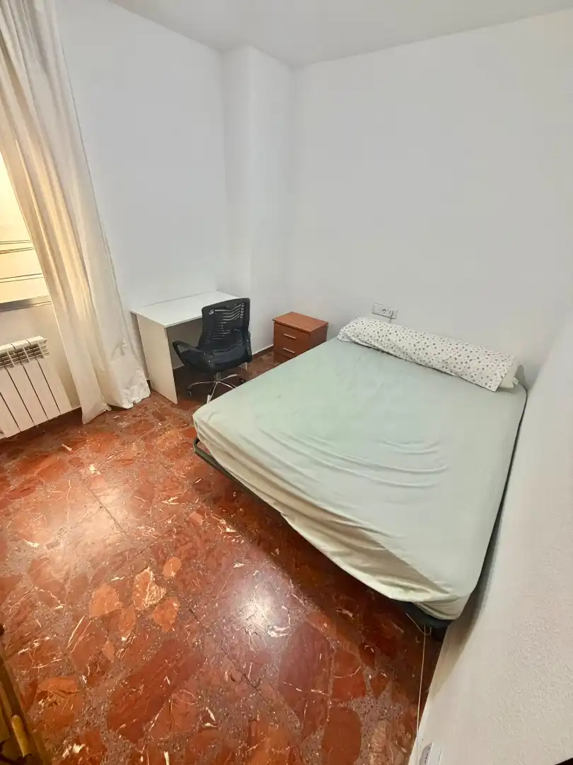 Bedroom of Flat for share in Jaén  with Air Conditioner, Heating and Furnished