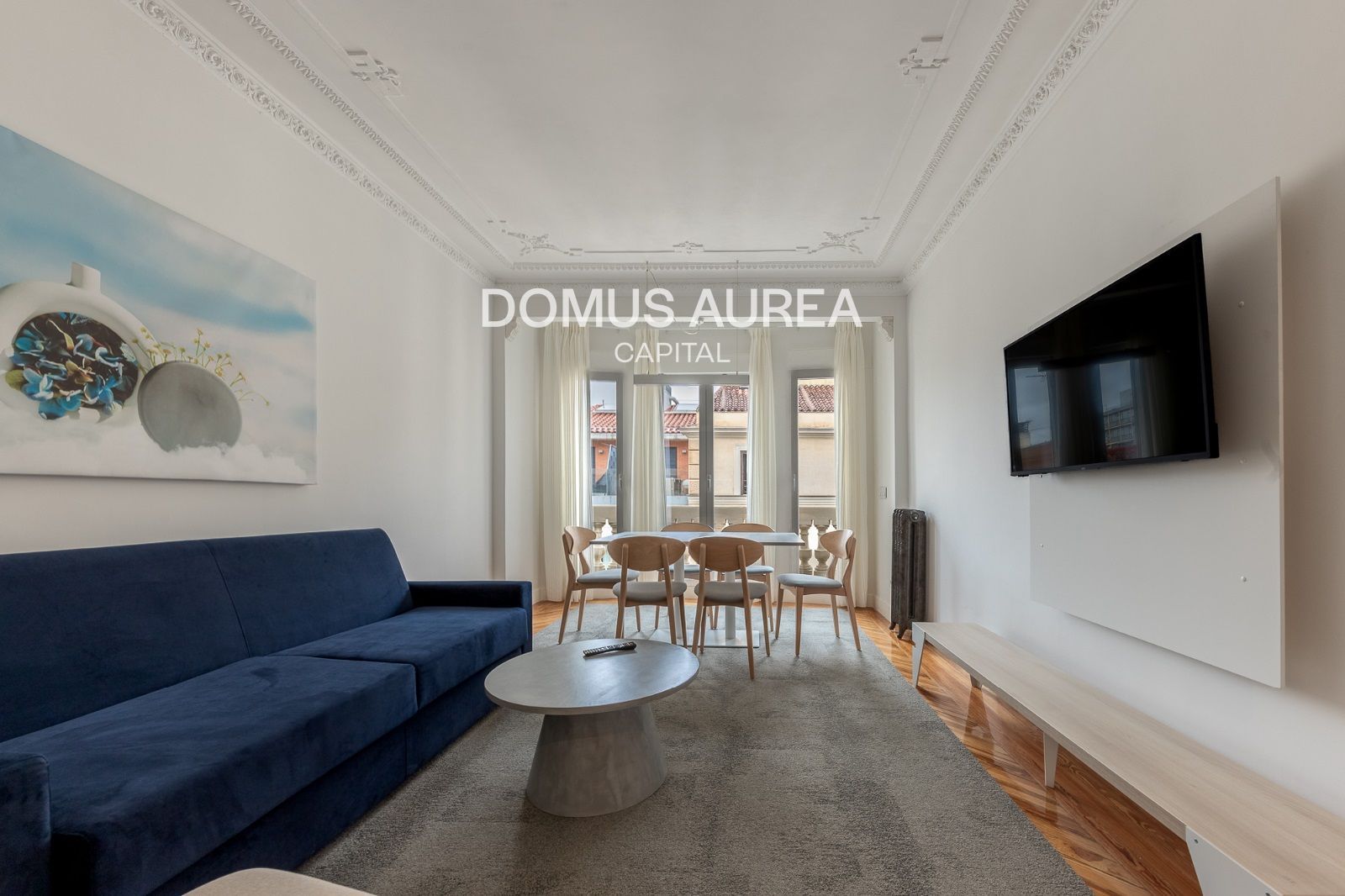 Sala d'estar de Àtic de lloguer en  Madrid Capital amb Aire condicionat, Terrassa i Moblat