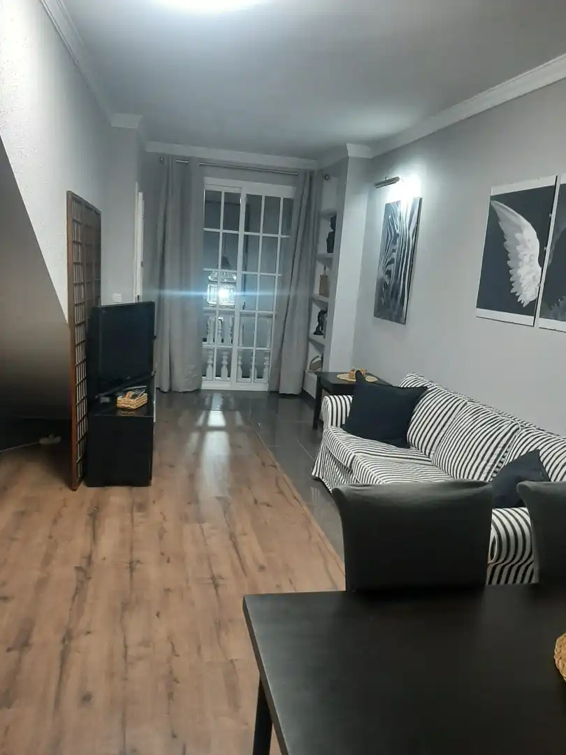 Living room of Flat for rent in Villaverde del Río  with Air Conditioner, Parquet flooring and Furnished
