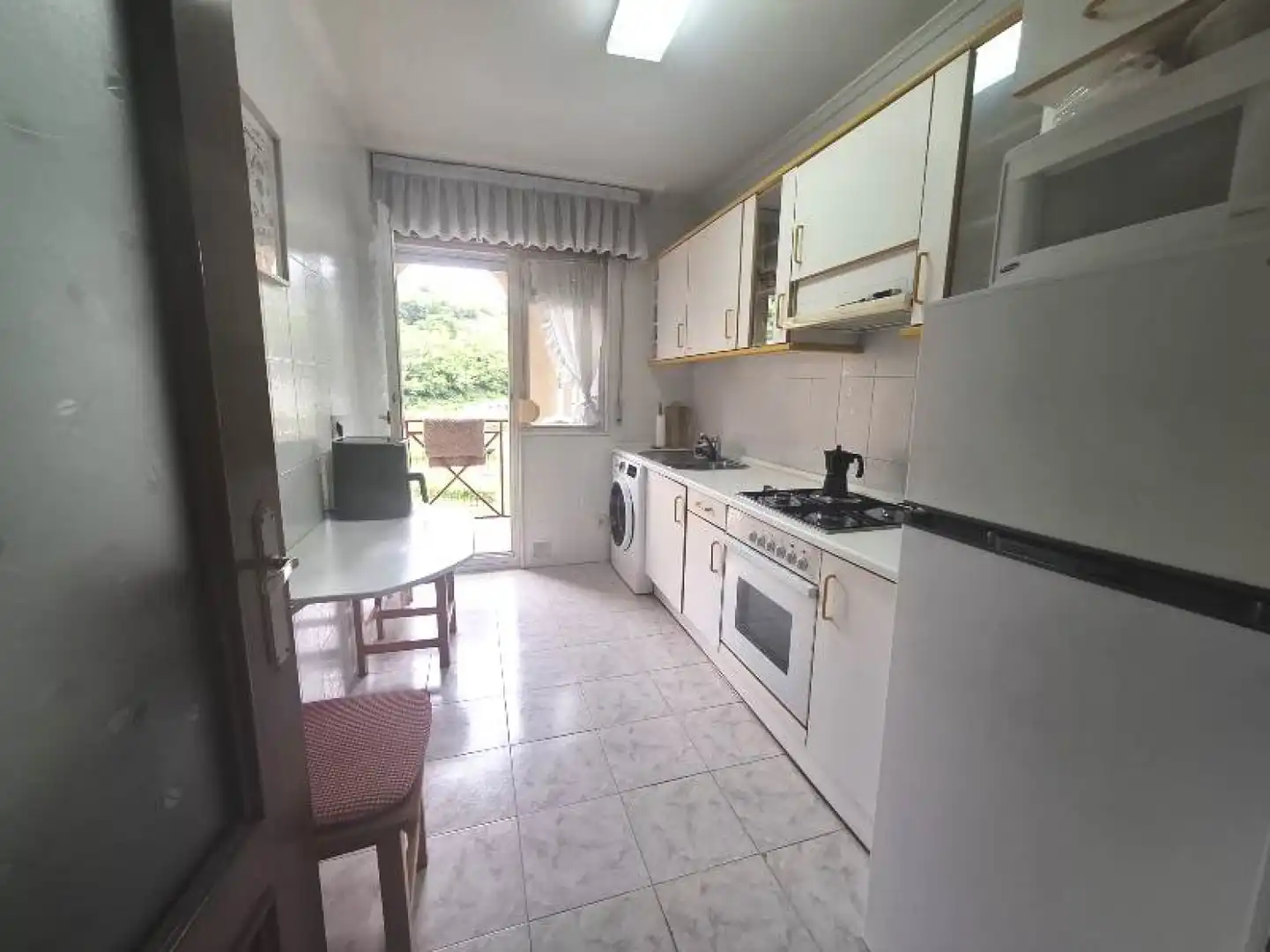 Kitchen of Flat for rent in Valdáliga  with Parquet flooring, Terrace and Furnished