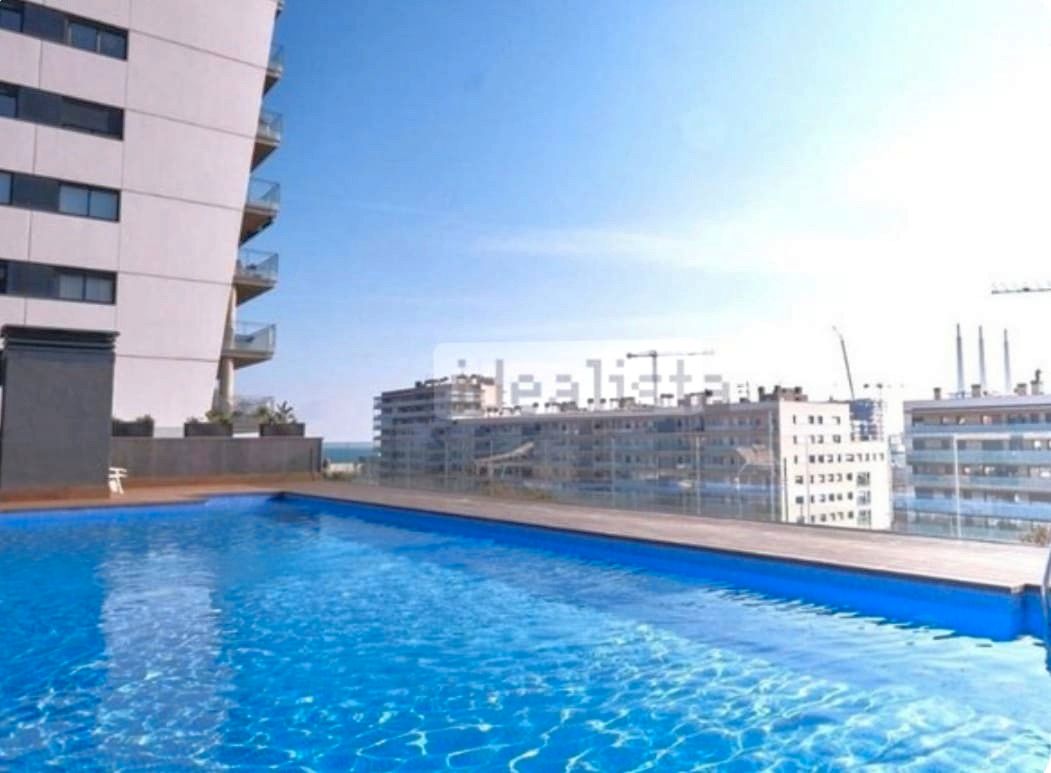 Swimming pool of Flat for sale in Badalona  with Air Conditioner, Heating and Parquet flooring