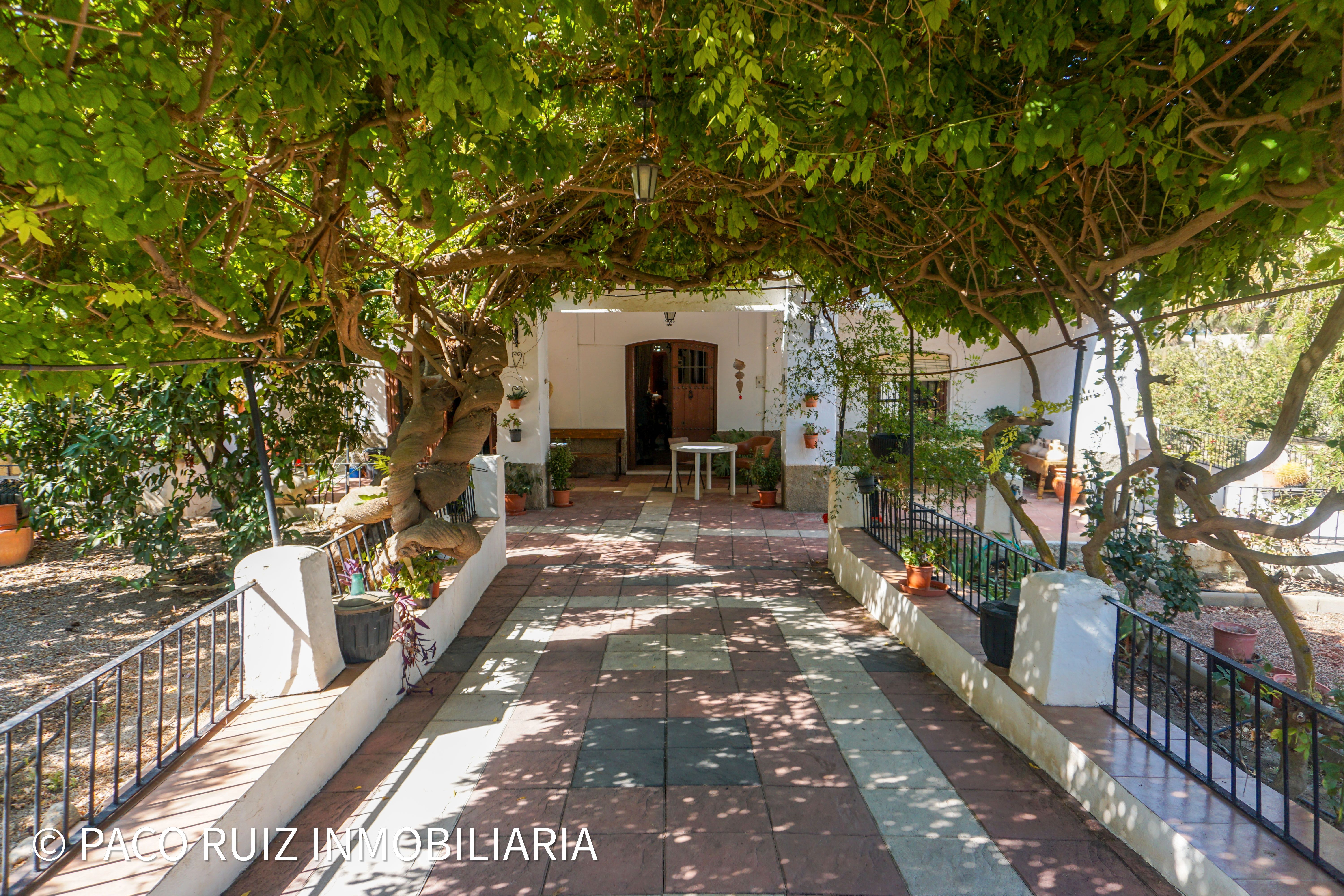 Vista exterior de Finca rústica en venda en Terque amb Jardí privat