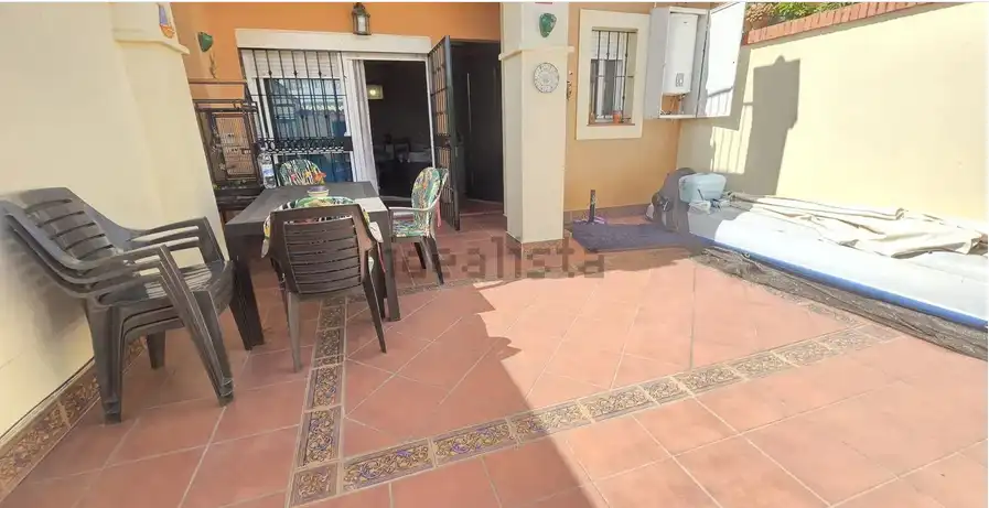 Terrassa de Casa adosada en venda en El Portil amb Aire condicionat i Balcó