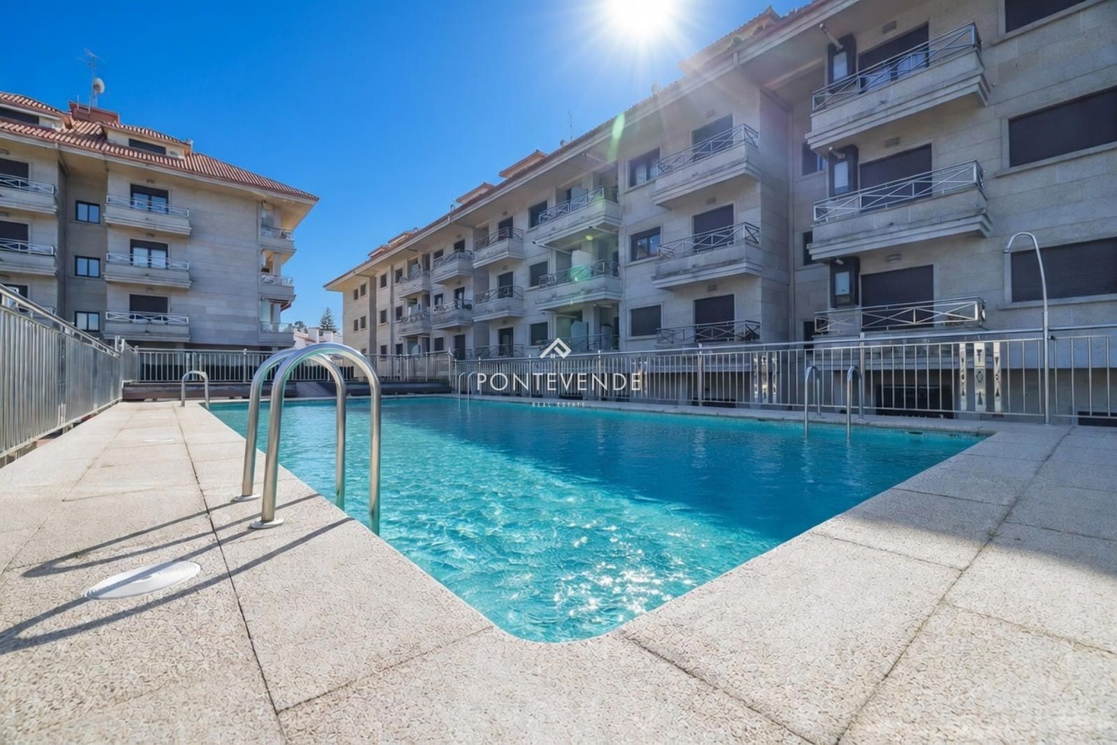 Swimming pool of Flat for sale in Sanxenxo  with Heating, Parquet flooring and Terrace