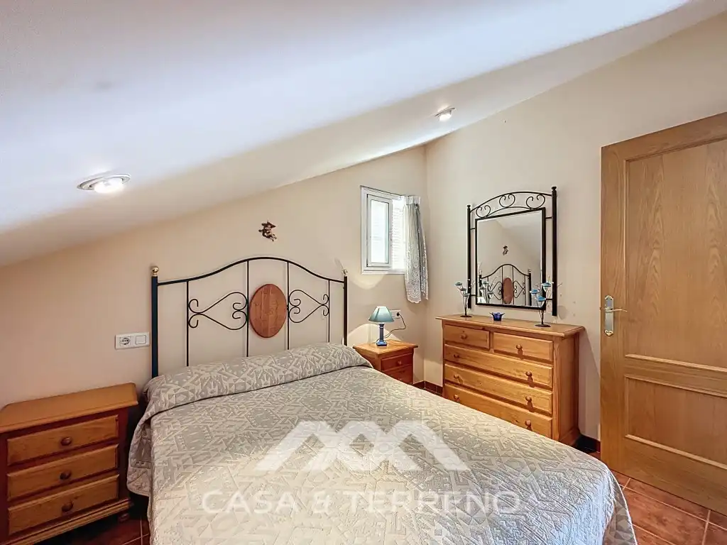Dormitori de Casa adosada en venda en Vélez-Málaga amb Aire condicionat, Piscina i Microones