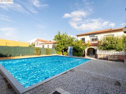 Swimming pool of House or chalet for sale in Cúllar Vega  with Air Conditioner and Swimming Pool