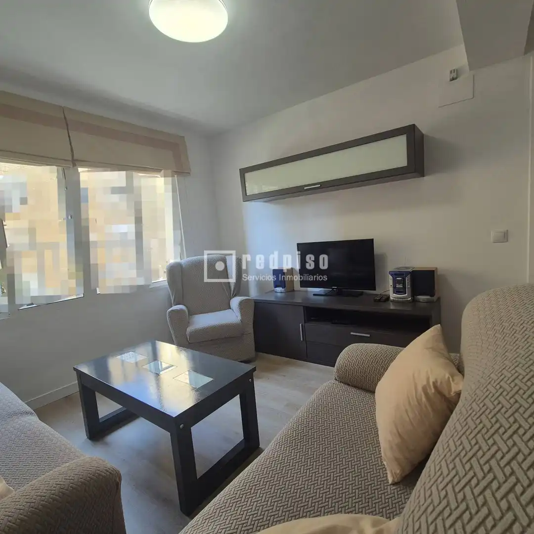 Sala d'estar de Pis de lloguer en Sevilla amb Aire condicionat, Terrassa i Moblat