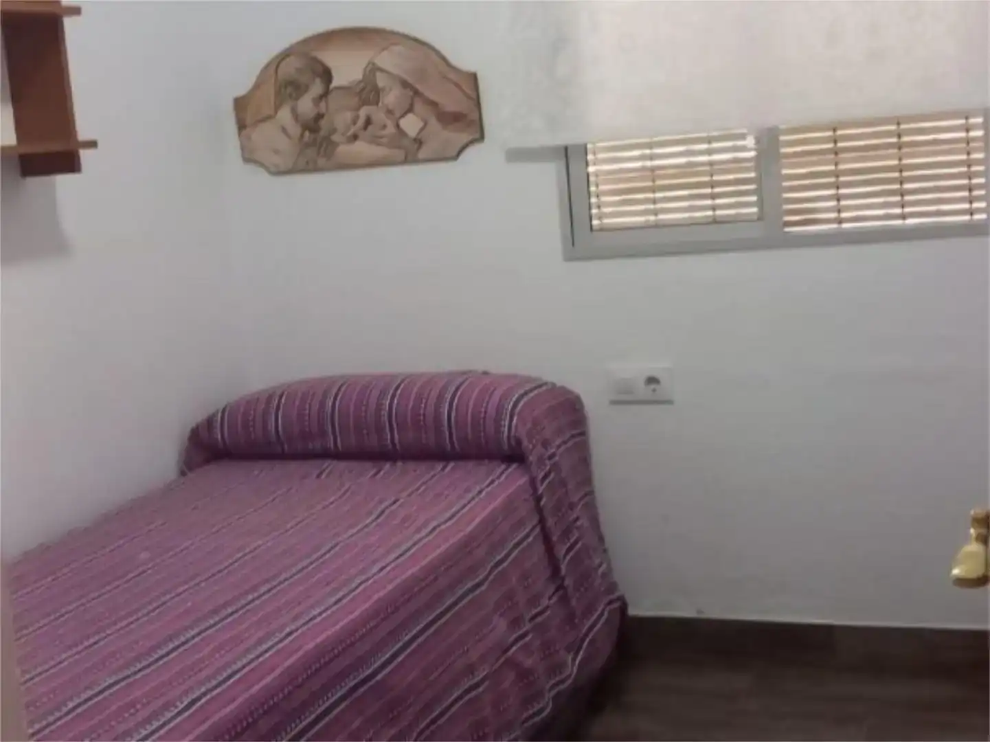 Dormitori de Casa adosada de lloguer en Chipiona amb Aire condicionat i Moblat