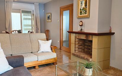 Living room of Single-family semi-detached for sale in Roda de Berà  with Air Conditioner and Terrace