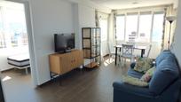 Sala d'estar de Apartament en venda en Benidorm amb Aire condicionat, Jardí privat i Terrassa