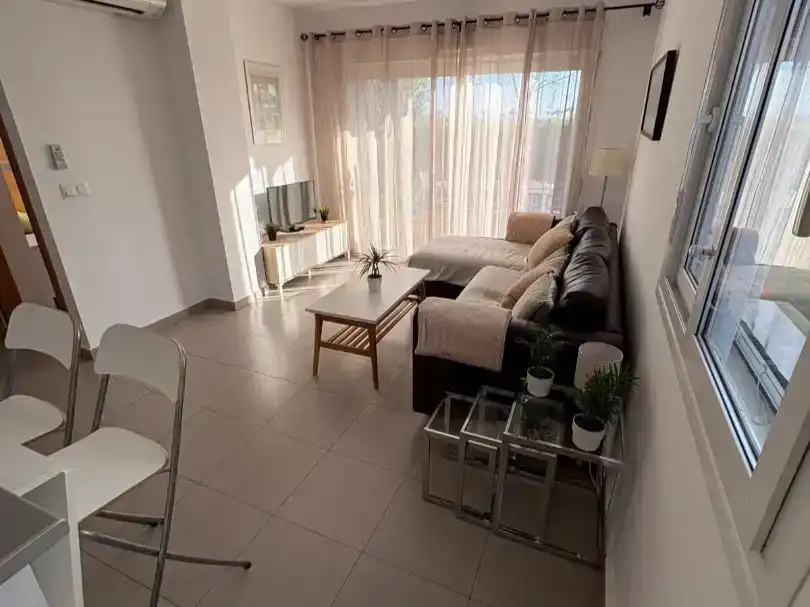 Sala d'estar de Apartament de lloguer en Torre-Pacheco amb Aire condicionat, Jardí privat i Moblat