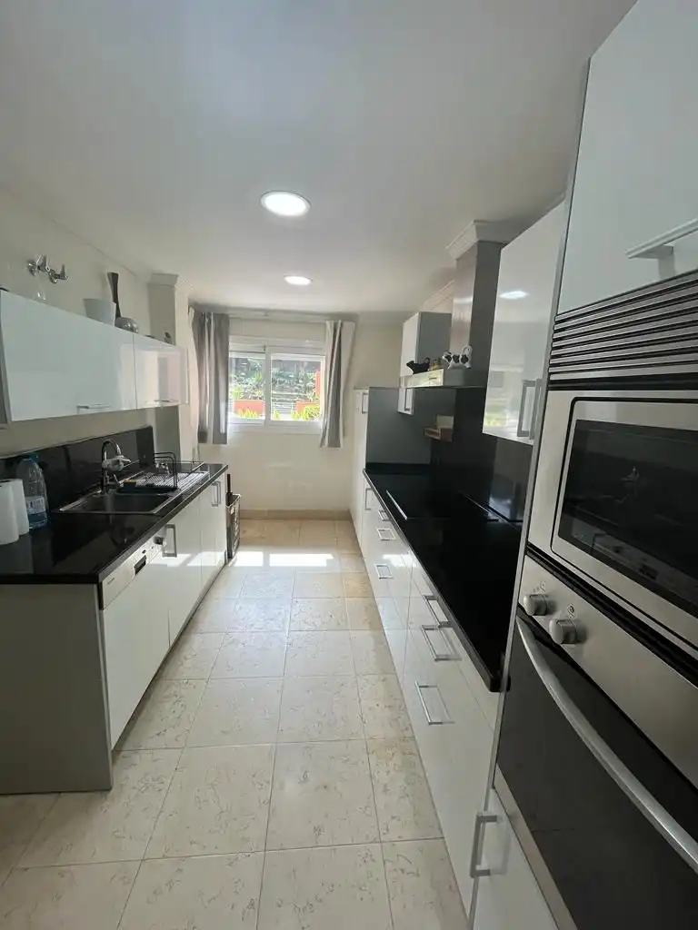 Kitchen of Flat for rent in Marbella  with Air Conditioner, Terrace and Swimming Pool
