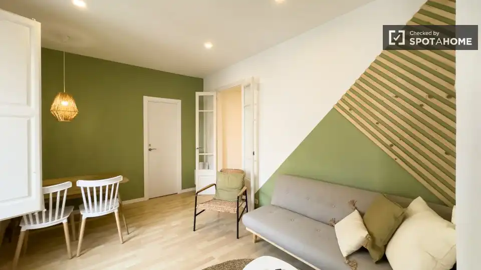 Sala de estar de Piso para compartir en Barcelona con Aire acondicionado, Calefacción y Amueblado