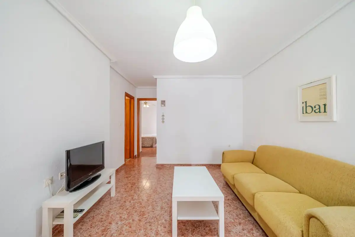 Wohnzimmer von Erdgeschoss zum Verkauf in Santa Pola mit Heizung, Privatgarten und Terrasse