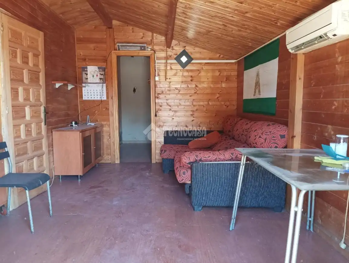 Sala de estar de Finca rústica en venta en Arahal con Aire acondicionado, Parquet y Piscina