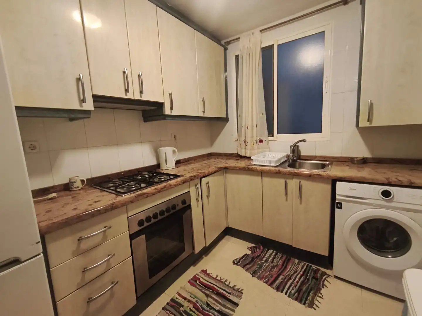 Küche von Wohnung zum Verkauf in Burjassot mit Parkett, Ofen und Waschmaschine