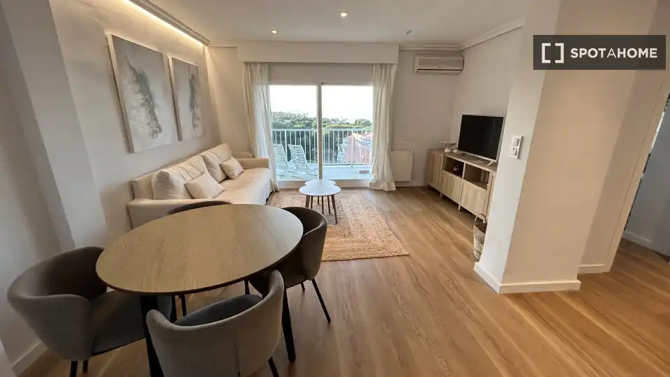 Sala d'estar de Apartament per a compartir en Dénia amb Aire condicionat, Calefacció i Terrassa