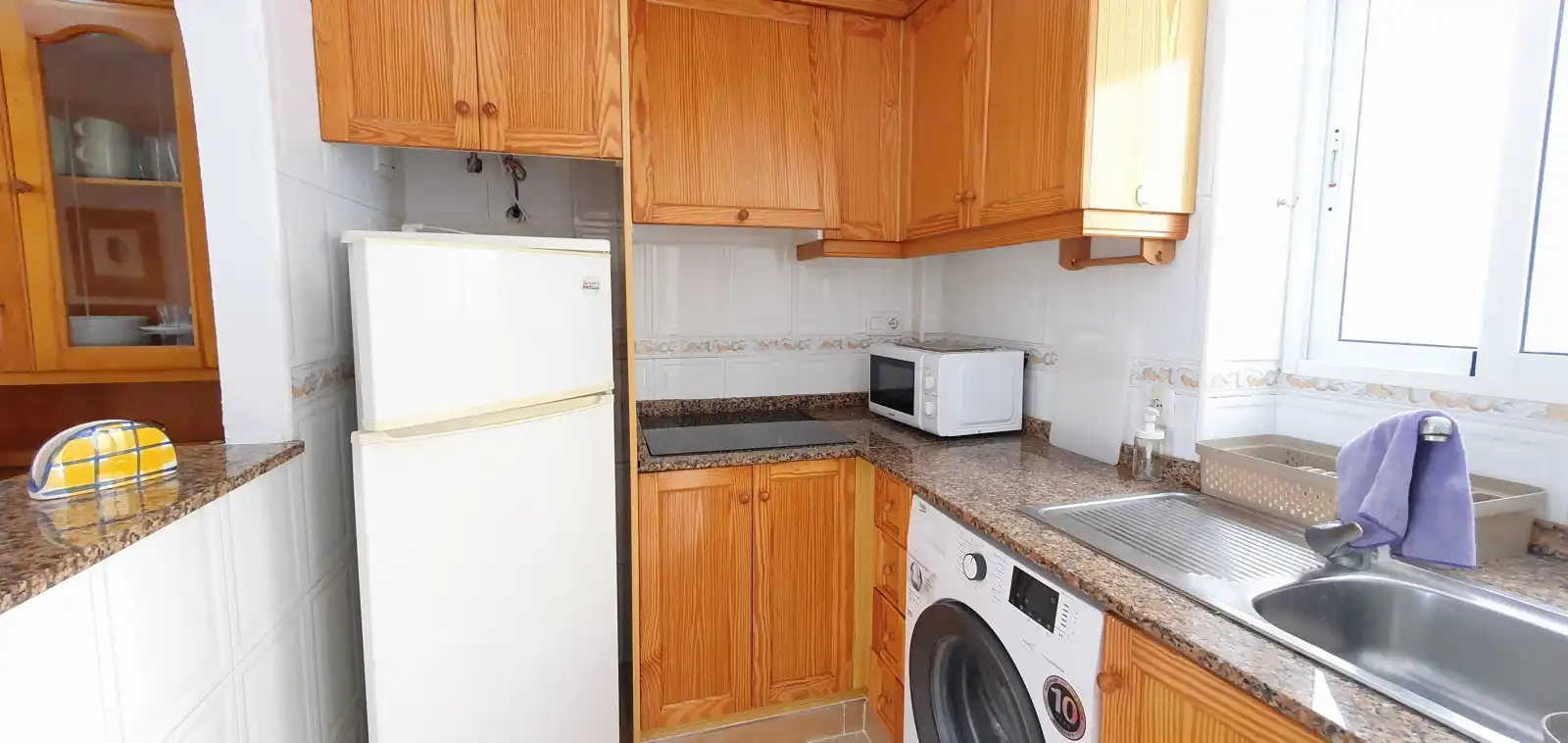Cuina de Apartament de lloguer en Dénia amb Aire condicionat, Calefacció i Terrassa