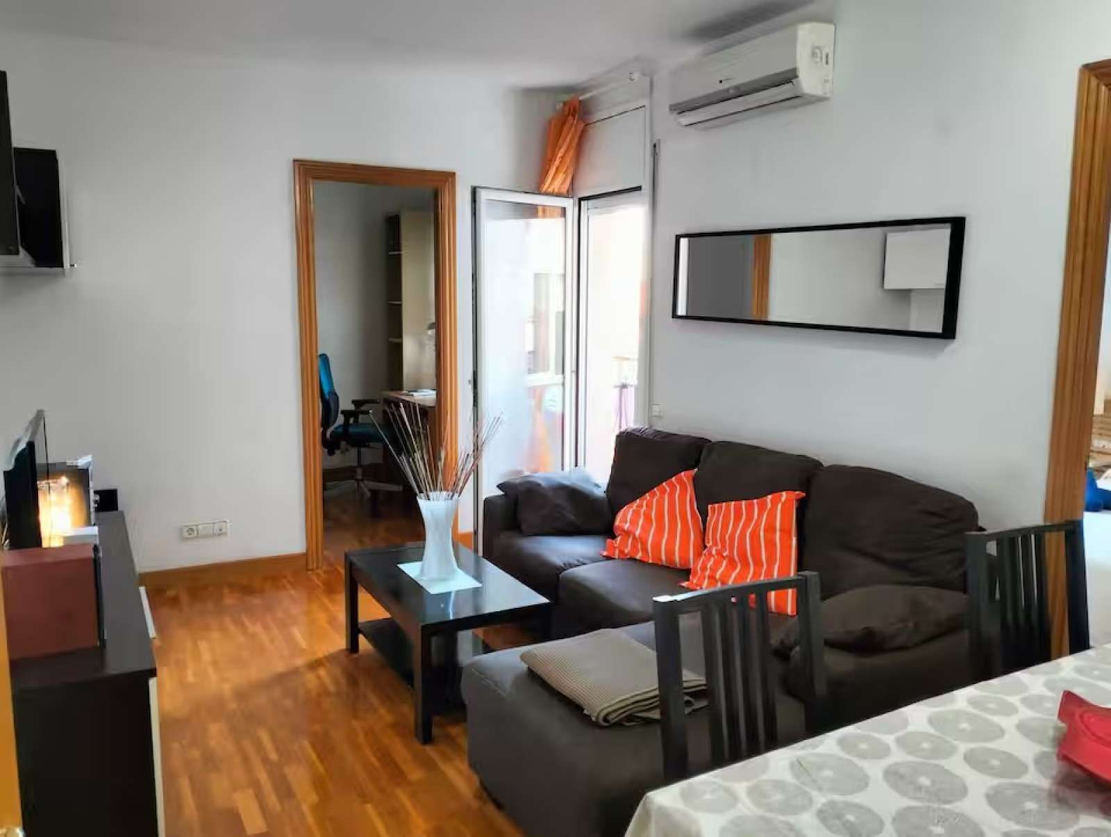 Sala de estar de Apartamento para compartir en  Barcelona Capital con Aire acondicionado, Terraza y Amueblado