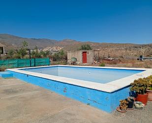 Piscina de Finca rústica de lloguer en Pechina amb Aire condicionat, Jardí privat i Terrassa