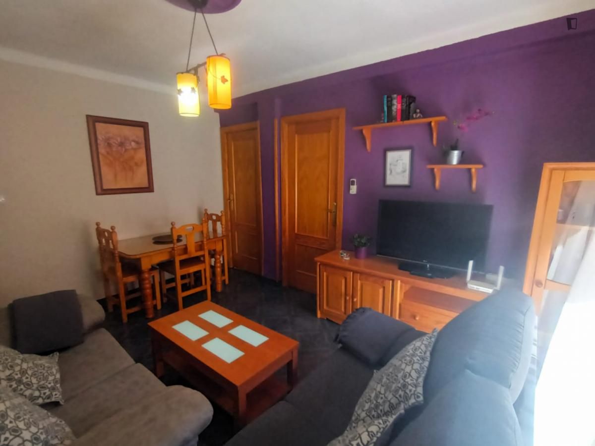 Sala d'estar de Apartament de lloguer en  Granada Capital amb Aire condicionat, Moblat i Forn