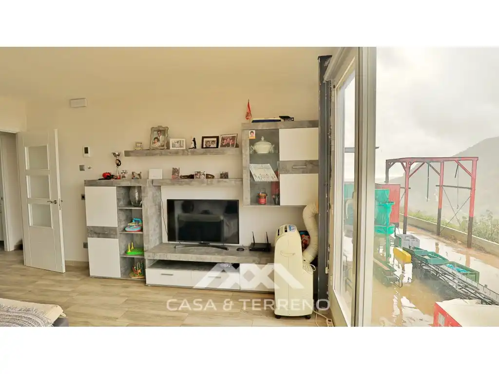 Sala d'estar de Casa o xalet en venda en Alfarnatejo amb Aire condicionat, Terrassa i Piscina